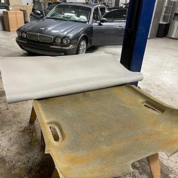 Jaguar headliner board before replacement, with deteriorated foam